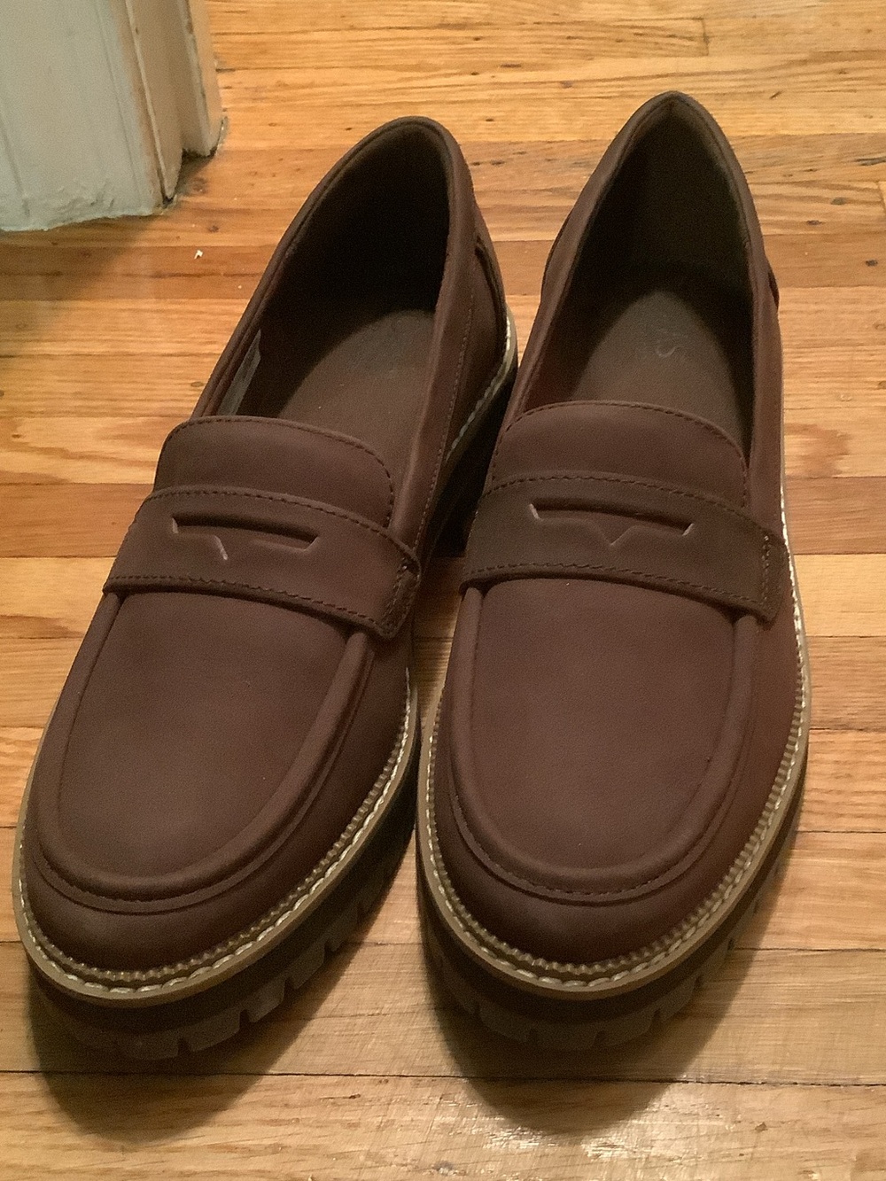 Brand new! Never worn! Brown loafers with 1 inch cushion sole.